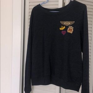 Crewneck with cute patches.